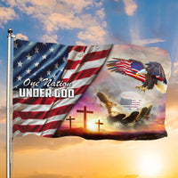 Waving patriotic grommet flag with eagle graphic, stars and stripes, and 'One Nation Under God'