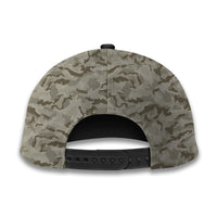 Olive camo baseball cap back panel with adjustable strap and ventilation eyelets.