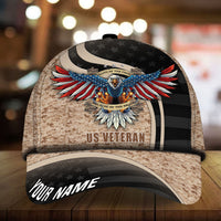 Tan camo baseball cap with 3D eagle emblem, 'US VETERAN' and 'YOUR NAME'—front view.
