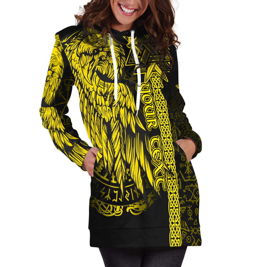 Yellow-and-black hoodie dress with front pocket, drawstring hood, and long sleeves