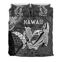 Black bedding set showing Hawaii text and large central shark and turtle print