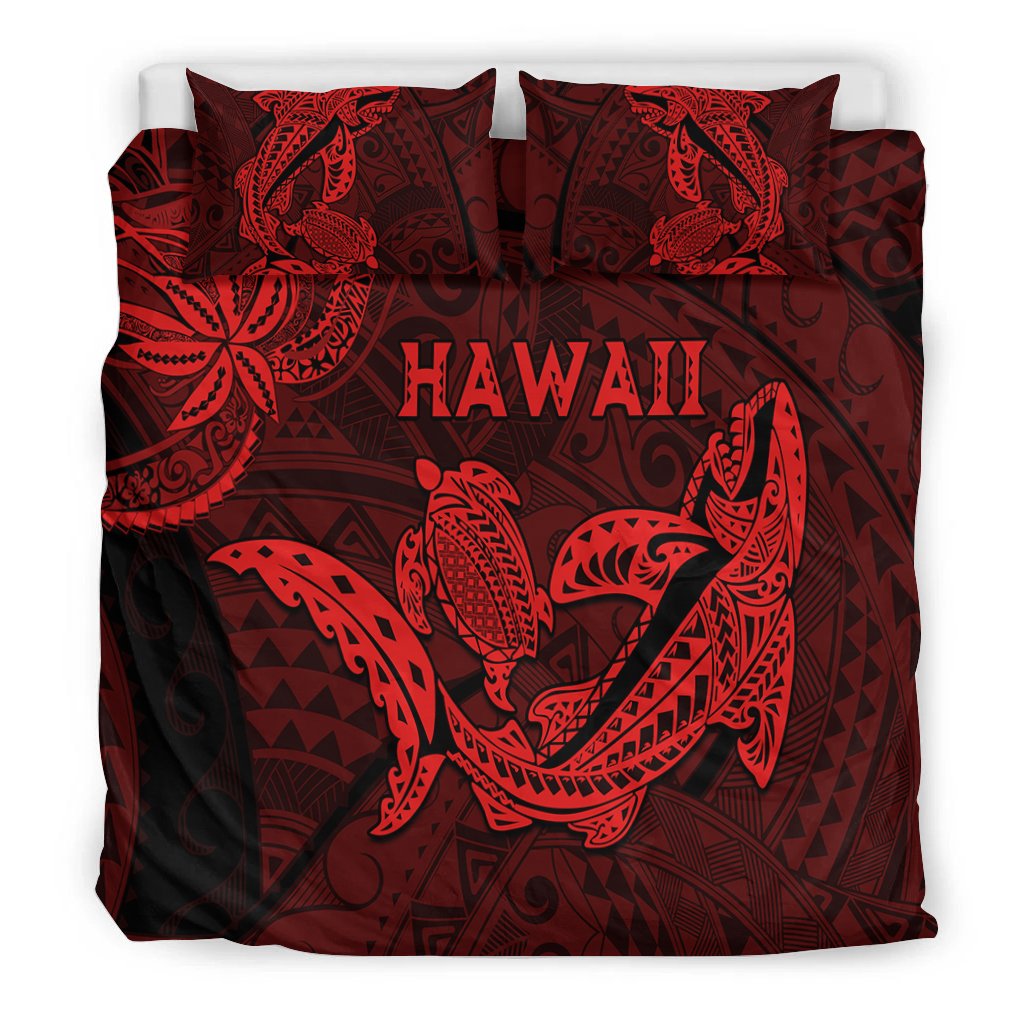 Red and dark bedding set with shark and turtle print, neatly arranged on bed