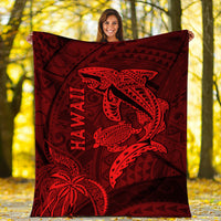 Red Hawaii blanket with shark and turtle artwork and bold geometric pattern