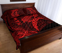 Red shark and turtle quilt with diamond quilting and HAWAII lettering on bed