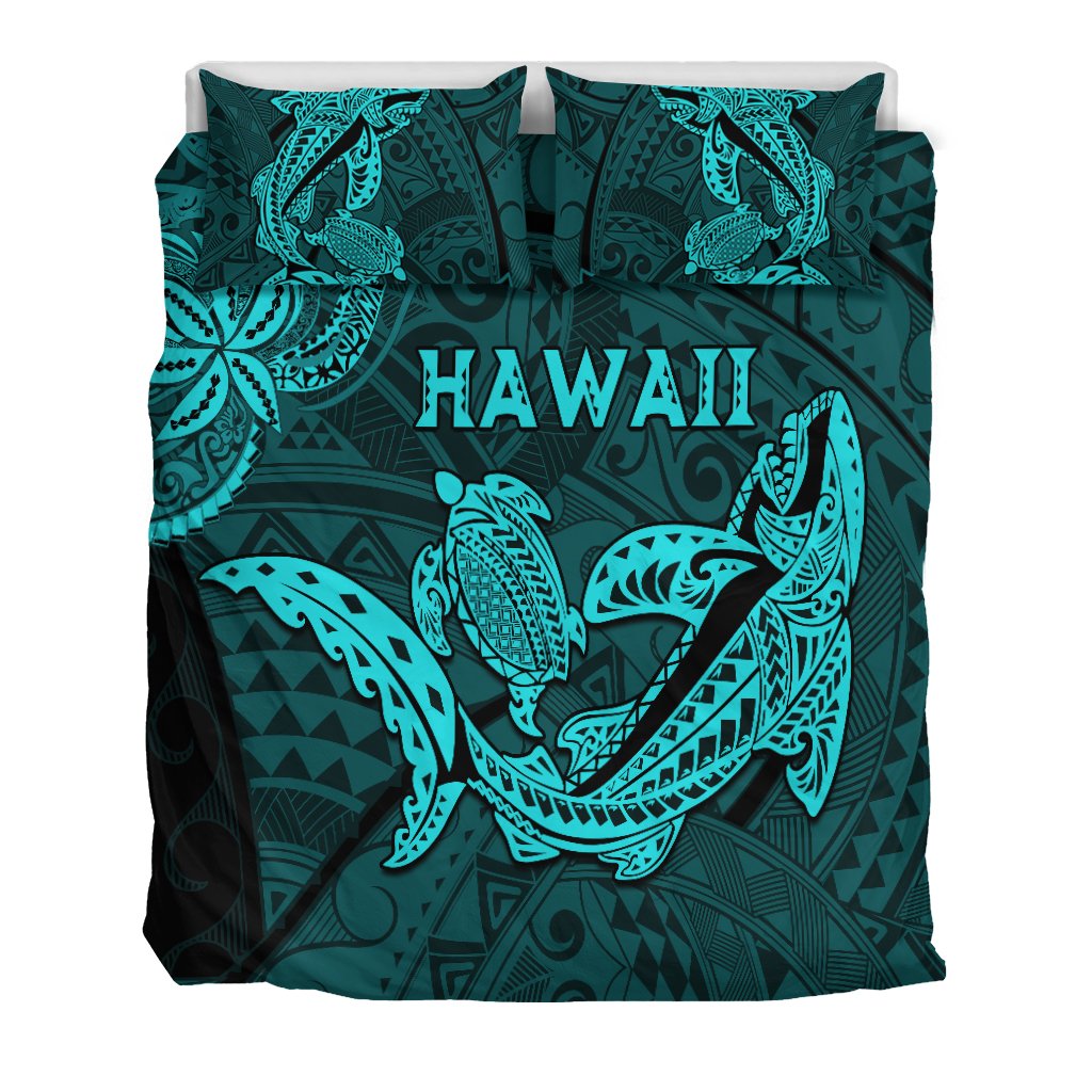 Dark teal duvet and pillowcases with turquoise shark and turtle artwork and 'HAWAII' text
