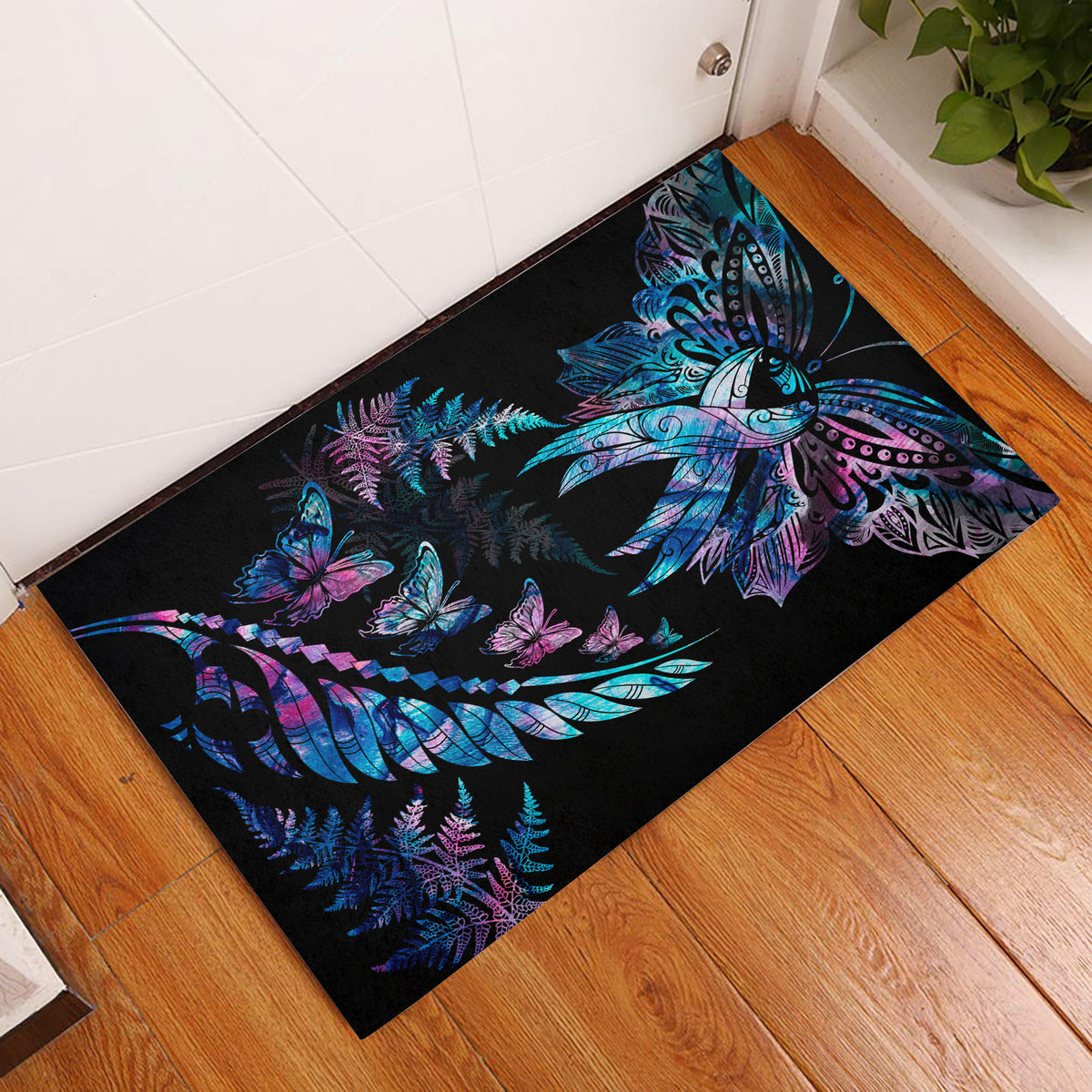 Black butterfly pattern door mat with colorful fern accents