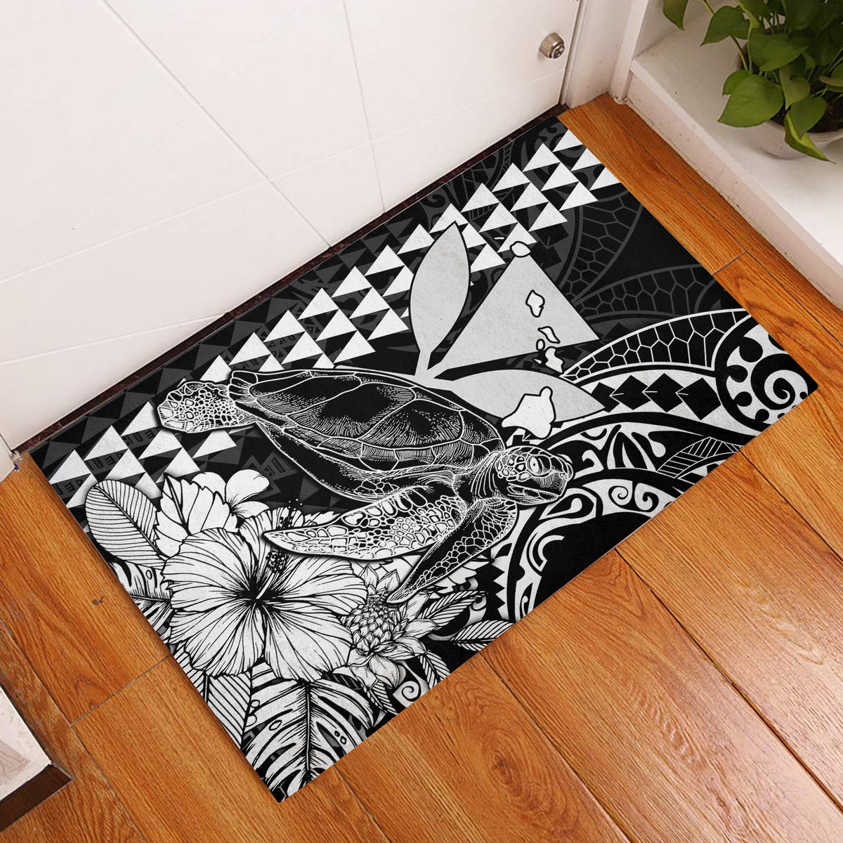 Black door mat with white sea turtle, coral and floral line art