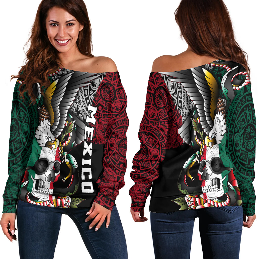 Off-shoulder black sweater with colorful skull, eagle, and snake graphic, long sleeves