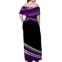 Off-shoulder maxi dress back view in purple and black tribal print across upper and hem