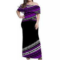 Off-shoulder long dress in purple and black with tribal patterned bodice and hem
