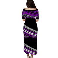 Back view: Purple and black puletasi dress with short sleeves, geometric zigzag band