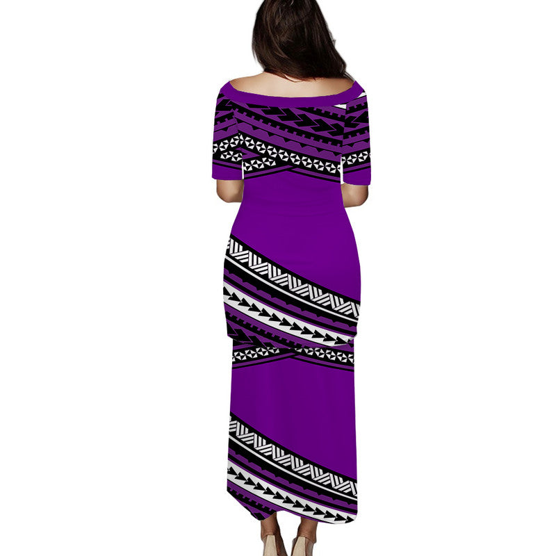 Purple long dress, back view, with bold geometric tribal print in striped bands