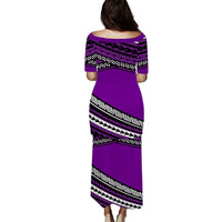 Purple long dress, back view, with bold geometric tribal print in striped bands