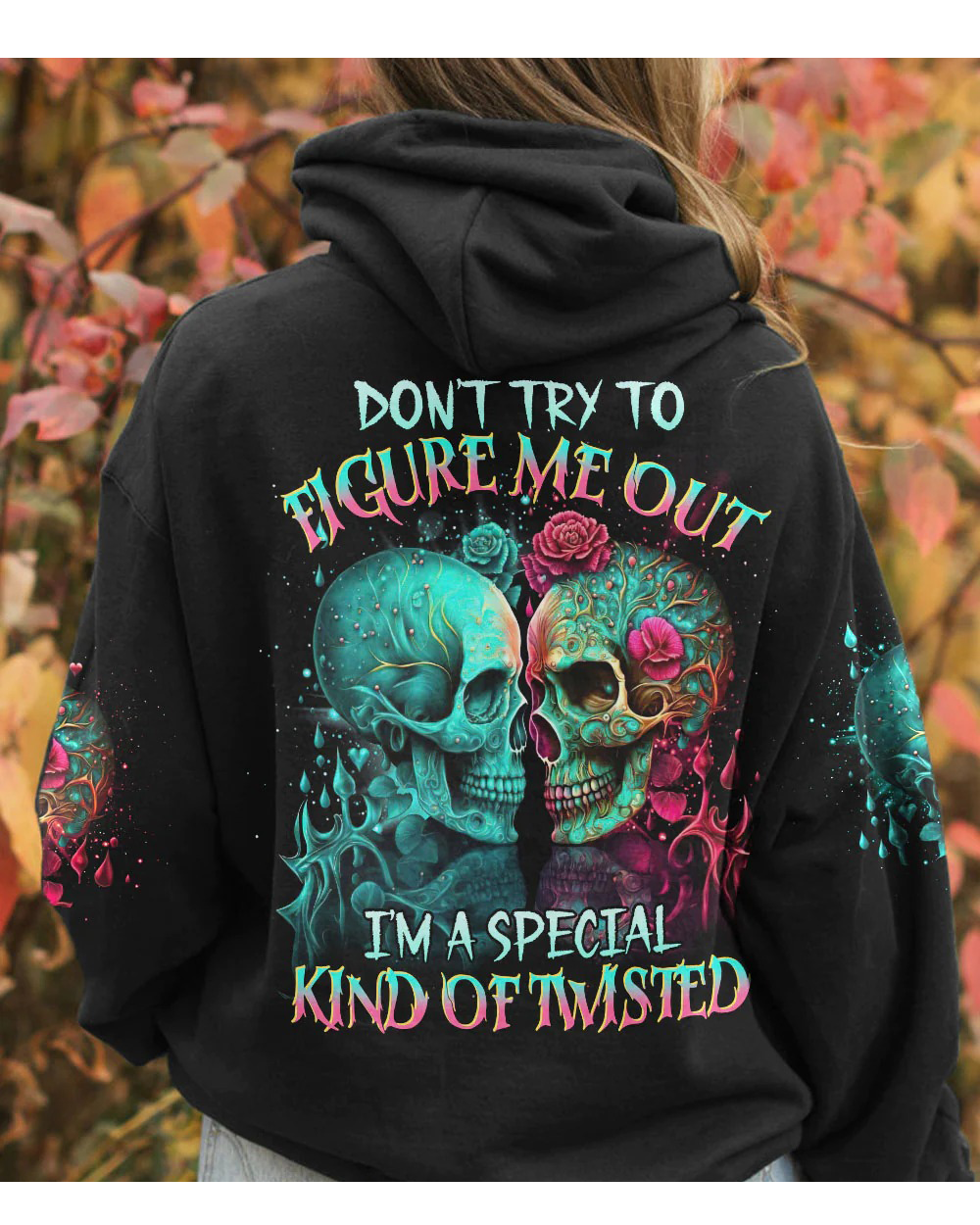 Black pullover hoodie with colorful twin skull and rose graphic on back, hood up