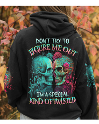 Black pullover hoodie with colorful twin skull and rose graphic on back, hood up