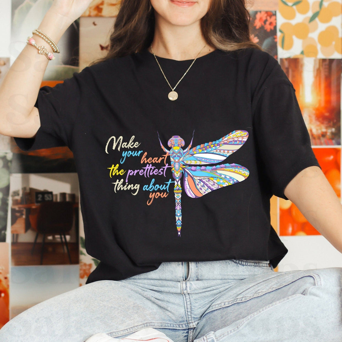 Black dragonfly inspirational T-shirt with heart quote graphic.