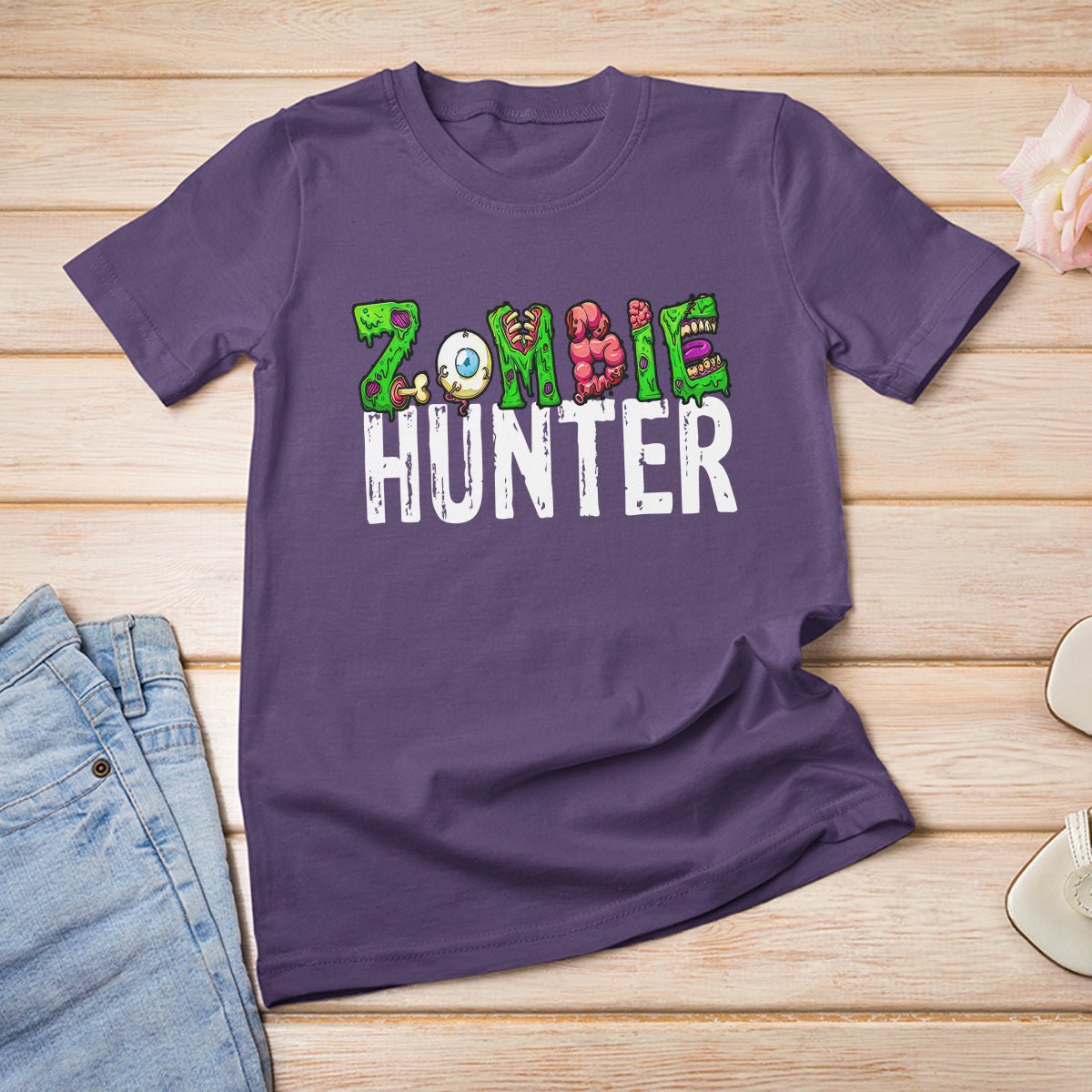Purple zombie hunter T-shirt with 'HUNTER' graphic and cartoon brain eye