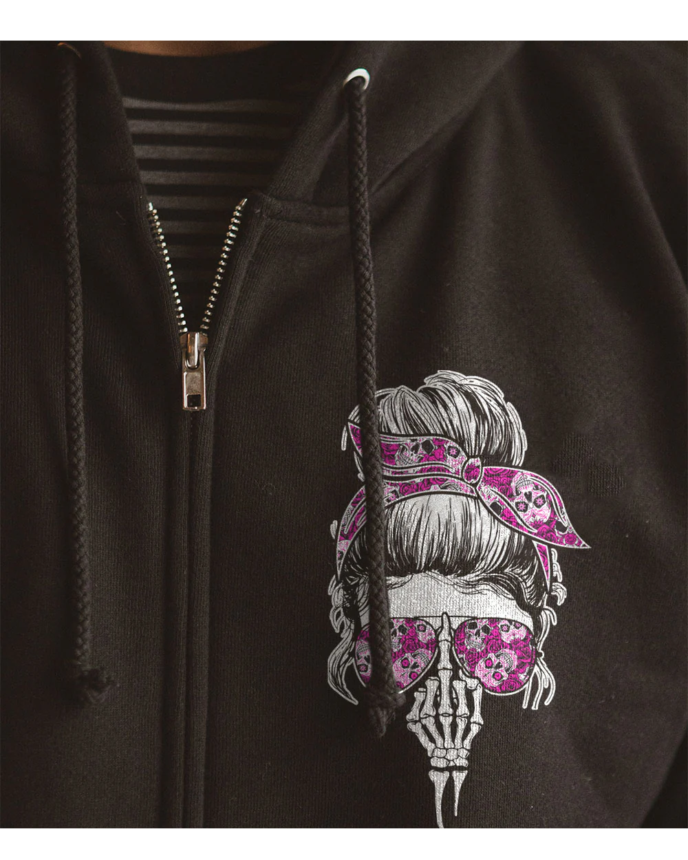 Black zip hoodie with pink skull graphic and silver zipper