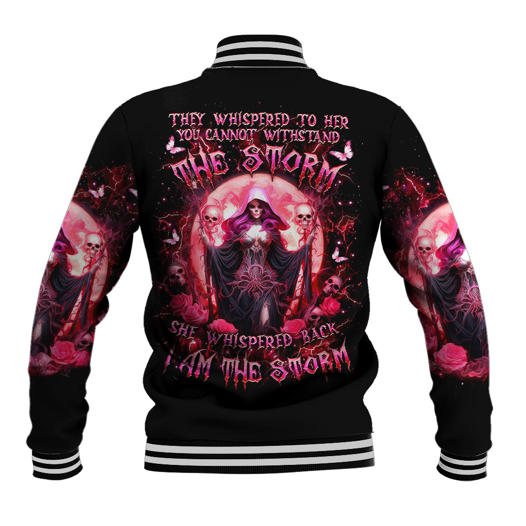 Black baseball jacket with witch skull graphic on back, ribbed striped collar and cuffs