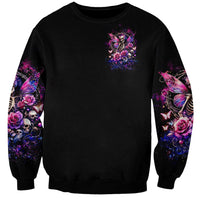 Black unisex sweatshirt with small chest fairy skull graphic and colorful sleeve designs