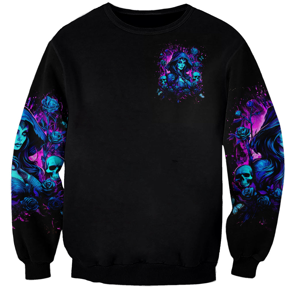Black witch skull sweatshirt with small chest graphic and blue-purple sleeve art