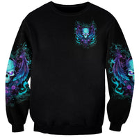 Black unisex crewneck sweatshirt with small chest angel skull graphic and sleeve flames