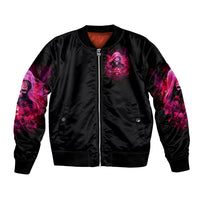 Black bomber jacket with pink witch skull graphic, front zipper and ribbed waistband