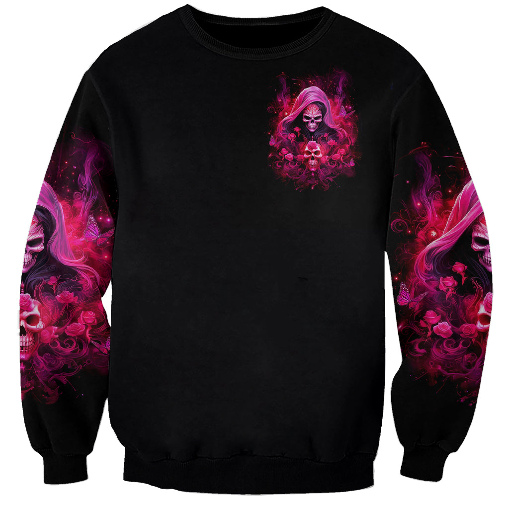 Black unisex sweatshirt with small magenta witch skull chest print and magenta sleeve art