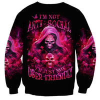 Black unisex sweatshirt with witch skull graphic and magenta skull text across front