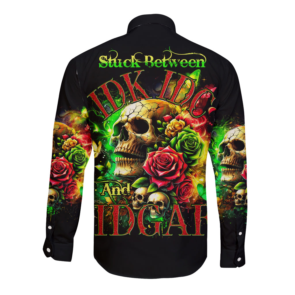 Black long-sleeve button shirt with skull and roses graphic on back