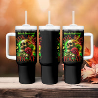 Set of three black tumblers with handles and straws; skull and rose front design