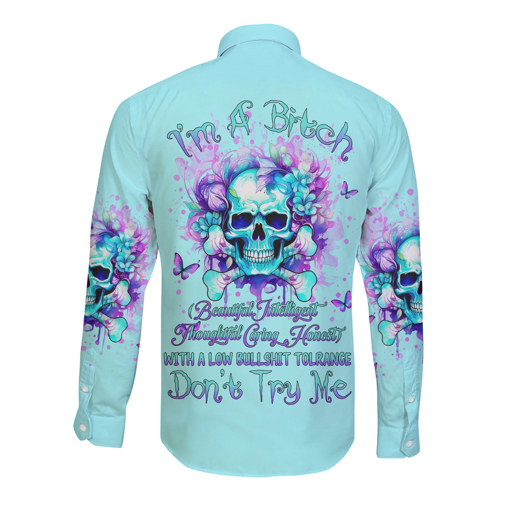 Unisex light blue long-sleeve button shirt with skull-flower graphic, back view