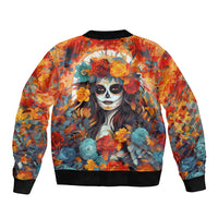 Yellow bomber jacket with black ribbed collar and hem, sugar skull face surrounded by roses print