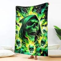 Green flame skull blanket with black hooded face and glowing skulls on ends
