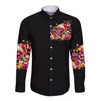 Black long-sleeve button-up shirt with festive skull graphic on chest and sleeves