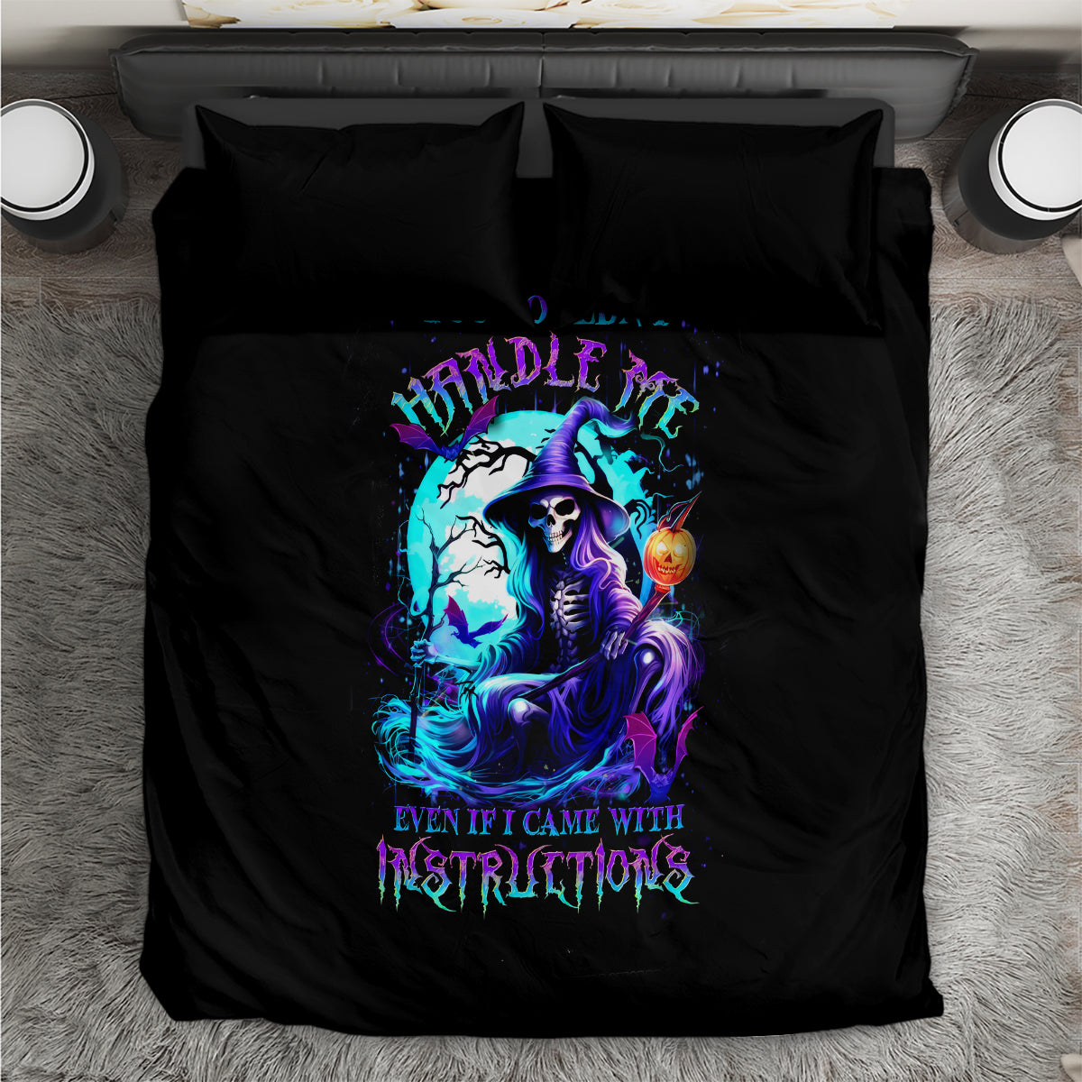 Black bedding set, top view, featuring a blue witch skull graphic and two pillows