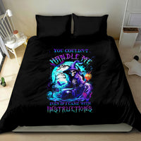 Black bedding set featuring blue witch skull graphic on the duvet with two pillows