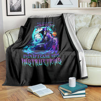 Black witch skull blanket with neon witch graphic, draped over couch arm
