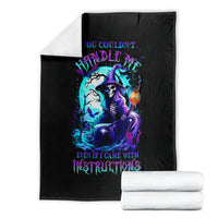 Black witch skull blanket with neon witch skull print, folded with white towels