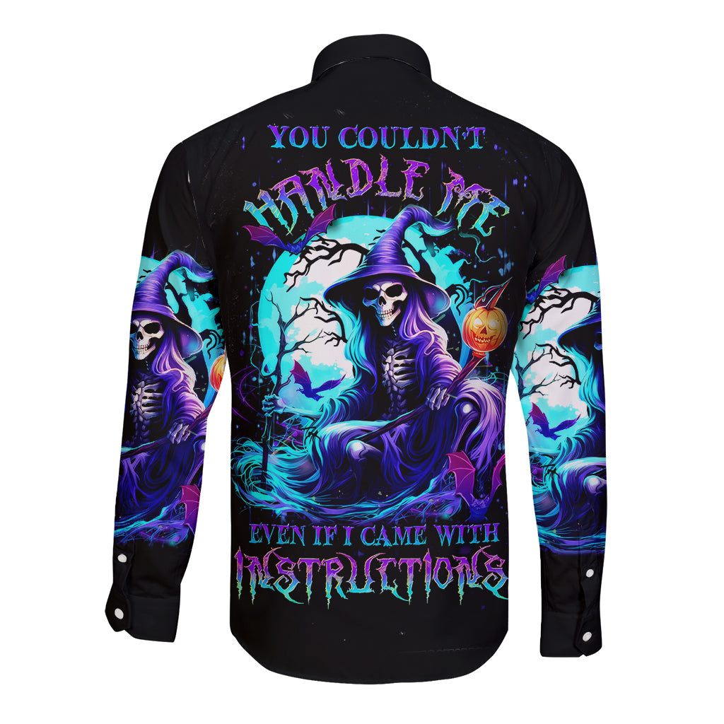 Black long-sleeve button shirt with witch skull graphic on back