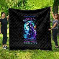 Black quilt with diamond stitching and colorful witch skull graphic, large throw blanket.