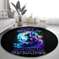 Black round carpet with purple witch skull graphic and glowing blue lettering