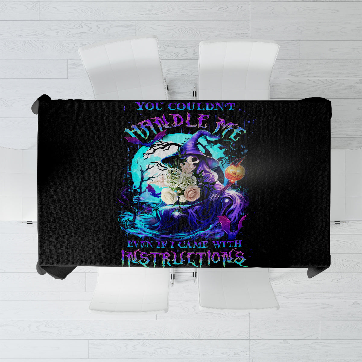 Black tablecloth panel with purple-blue skull illustration and bold warning text