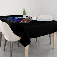 Black tablecloth with colorful skull design on dining table center