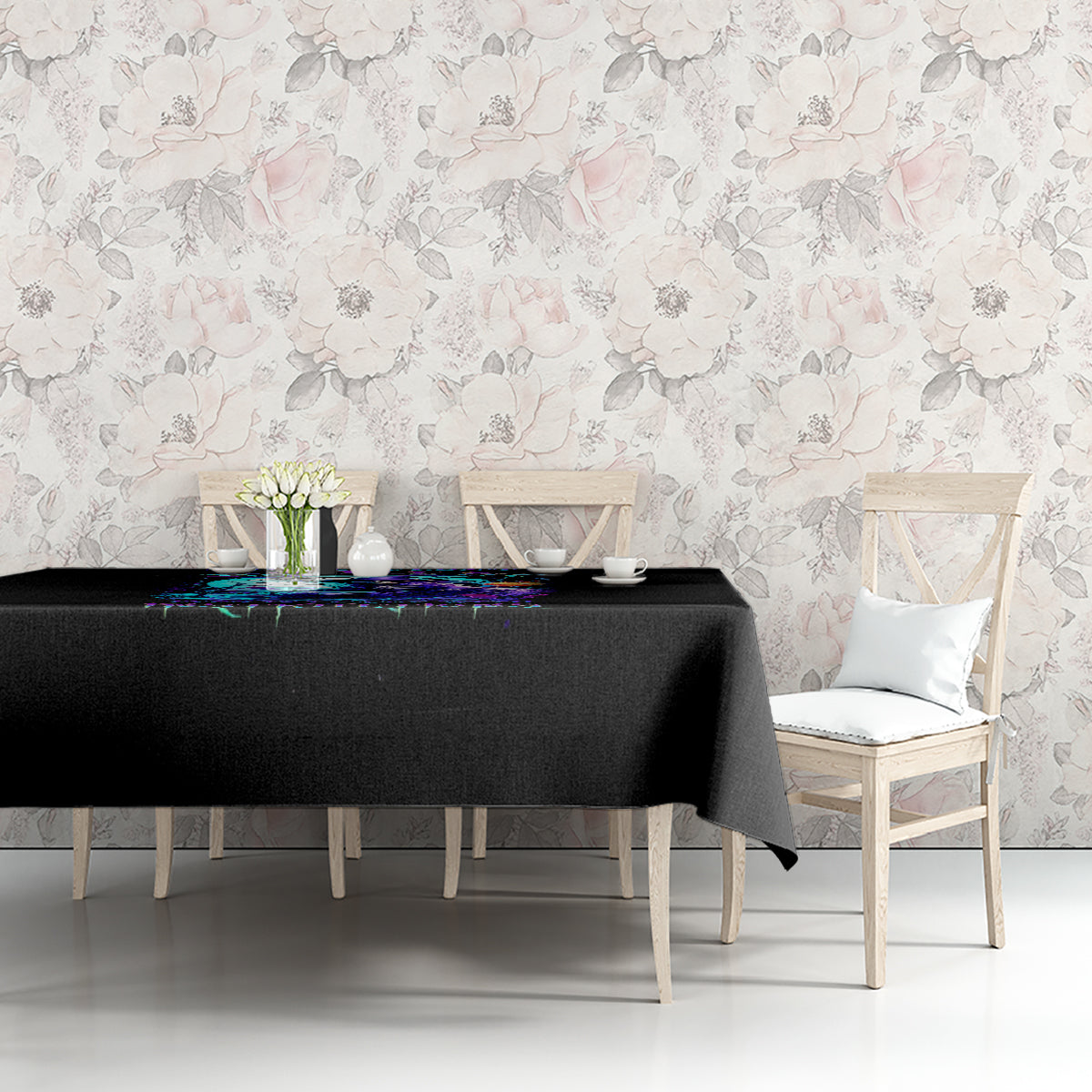 Black tablecloth with colorful skull motif on dining room table