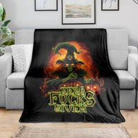 Black skull graphic blanket with colorful flames and “Zero Fucks Given” text