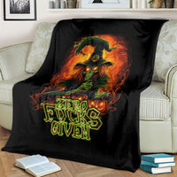 Black skull graphic throw blanket on sofa, “Zero Fucks Given” flaming design