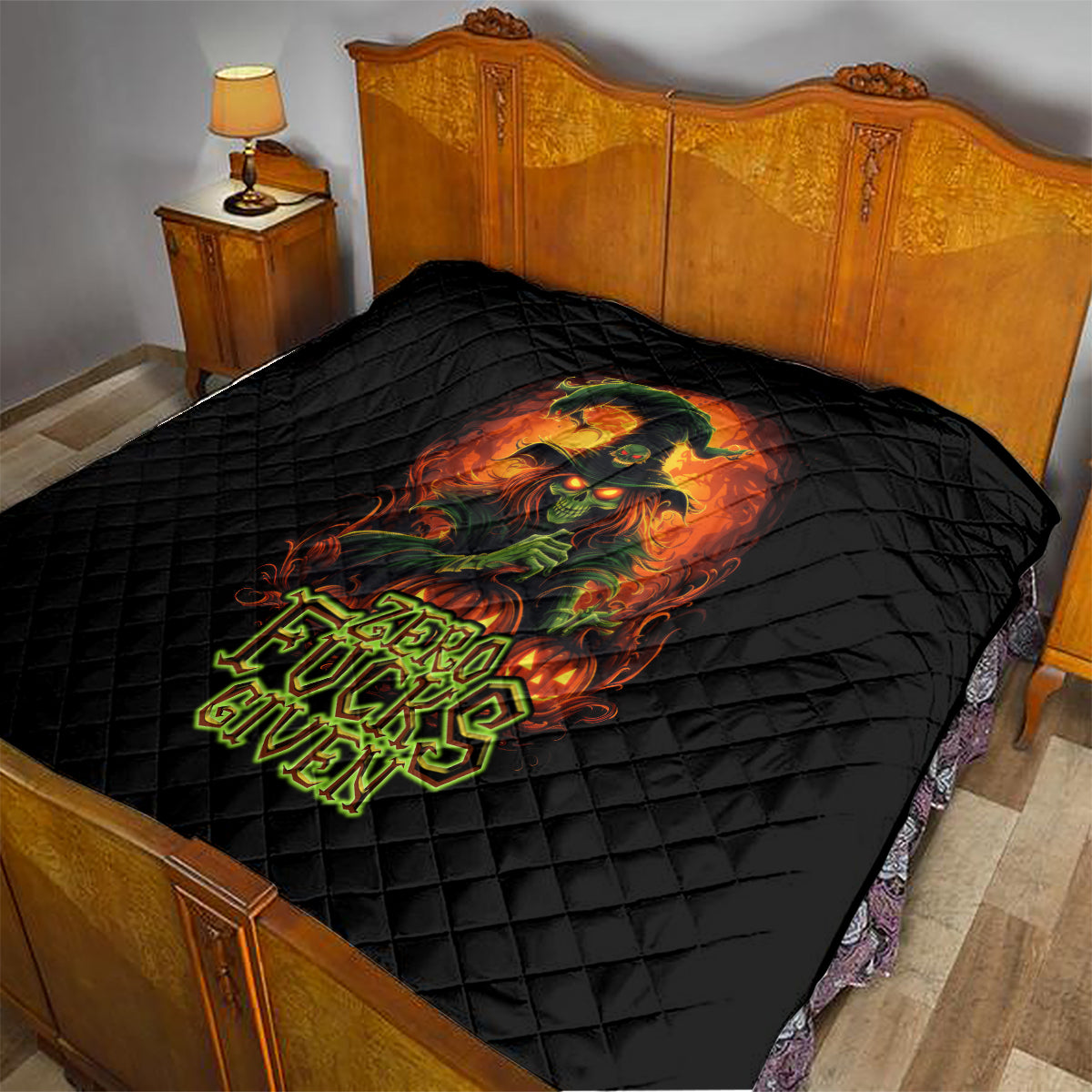 Black quilt on bed with witch skull design and neon Zero Fucks Given text