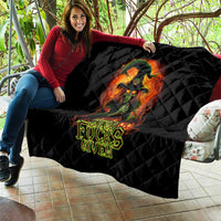 Black quilt on couch with witch skull and neon Zero Fucks Given graphic
