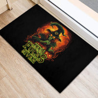 Black rubber doormat with colorful witch skull graphic and neon green text